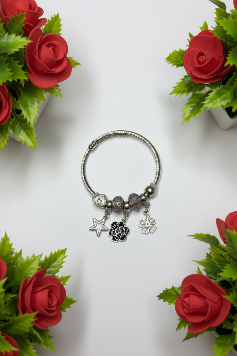 Silver tone charm bracelet