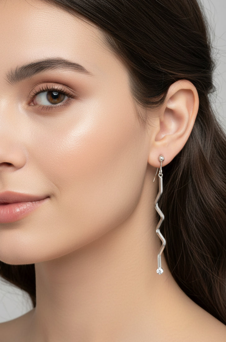 Elegant Silver Wavy Drop Earrings with Crystal Tips